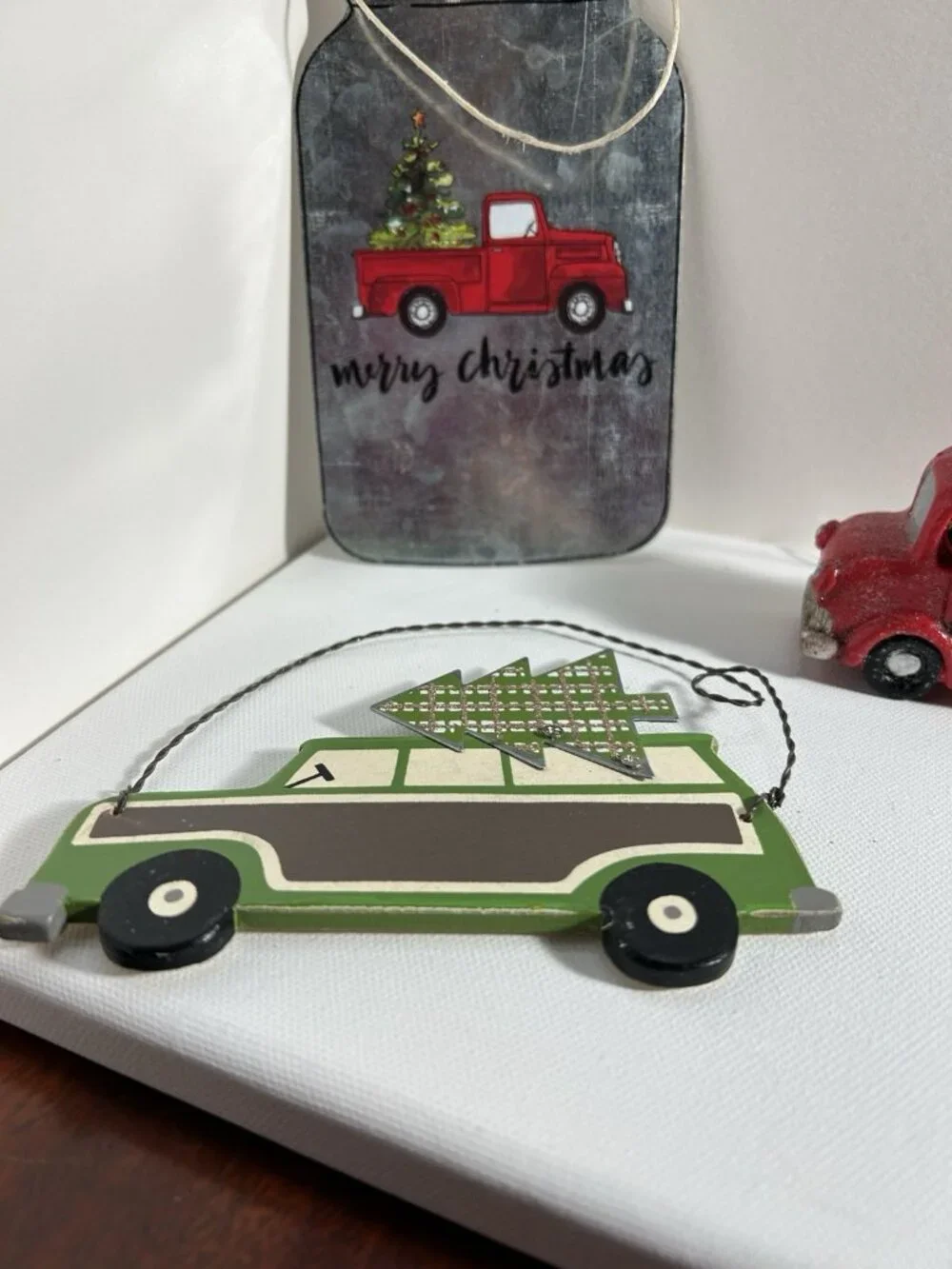 2 Red Truck Ornaments And One Green Vintage Look Car Ornament